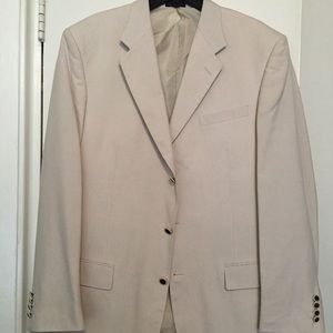 Cream blazer with black buttons